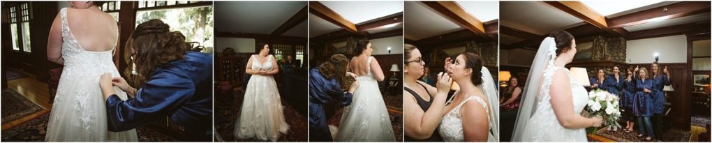 Premier snohomish & seattle wedding photographer | gsquared weddings photography a bride in a white gown is helped by attendants in blue robes as she gets ready indoors for her snohomish seattle wedding adjusting her dress and necklace then holding a bouquet and posing with her bridesmaids | serving snohomish seattle                   & beyond