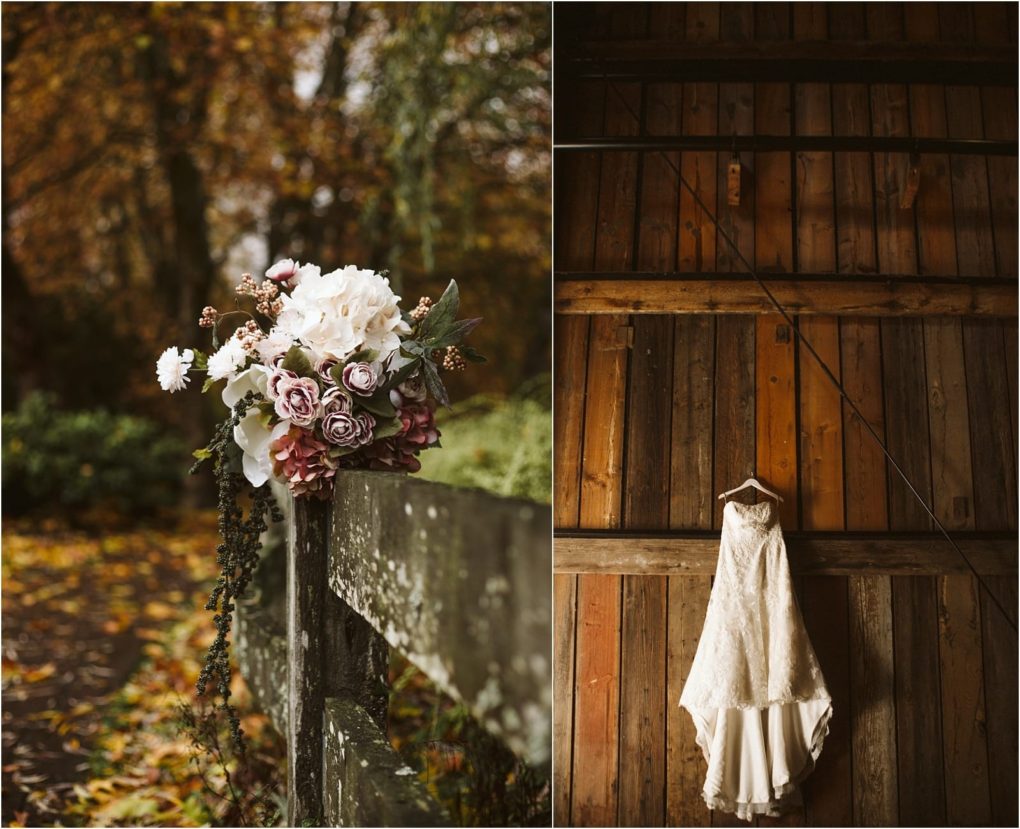 Premier snohomish & seattle wedding photographer | gsquared weddings photography a rustic snohomish seattle wedding scene a bouquet of white and mauve flowers rests on a weathered wooden fence outdoors while a lace wedding dress hangs inside on a wooden barn wall | serving snohomish seattle                   & beyond