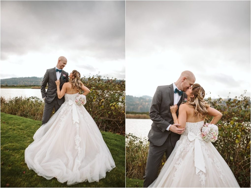 Premier snohomish & seattle wedding photographer | gsquared weddings photography a bride in a white gown holding a bouquet and a groom in a gray suit stand outdoors by a lake near snohomish embracing and smiling at each other on a cloudy day with lush greeneryperfect for a seattle wedding engagement | serving snohomish seattle                   & beyond