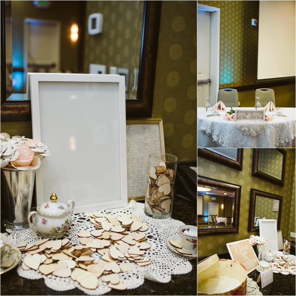 Premier snohomish & seattle wedding photographer | gsquared weddings photography a charming snohomish wedding reception setup features a blank white frame heart shaped wooden pieces on a lace covered table a teapot floral decorations and a mr & mrs sign in the background Perfect for your seattle engagement celebration | serving snohomish seattle                   & beyond