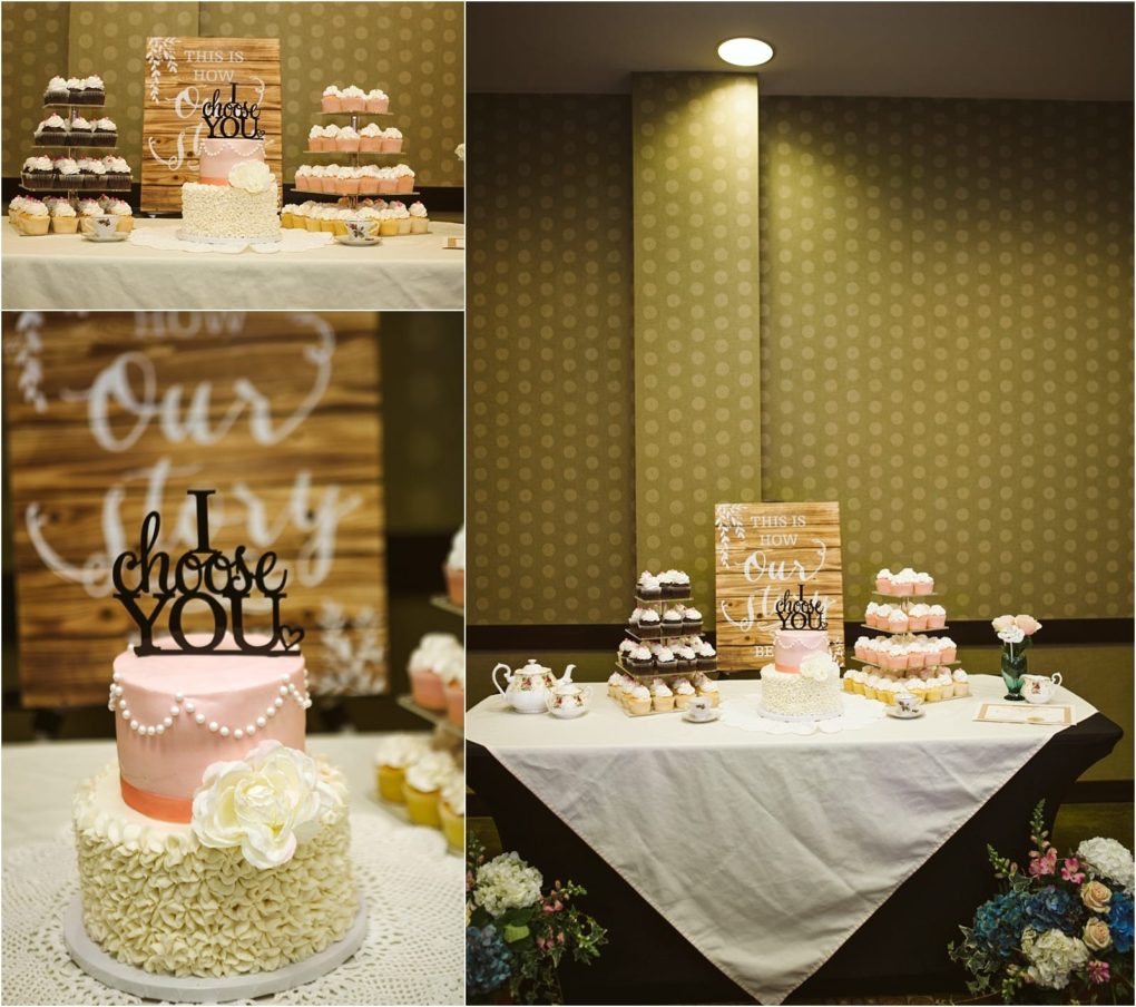 Premier snohomish & seattle wedding photographer | gsquared weddings photography a dessert table at a snohomish seattle wedding features cupcakes a pink and white cake that says i choose you and a sign reading this is how our story begins set against a patterned wall with floral decorations and soft lighting | serving snohomish seattle                   & beyond