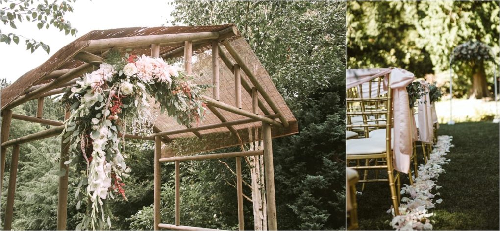 Premier snohomish & seattle wedding photographer | gsquared weddings photography a rustic wooden wedding arch decorated with pink and white flowers and greenery stands outdoors in snohomish rows of gold chairs with pink sashes and flower petals line the grass aisle nearby perfect for a charming seattle wedding engagement | serving snohomish seattle                   & beyond