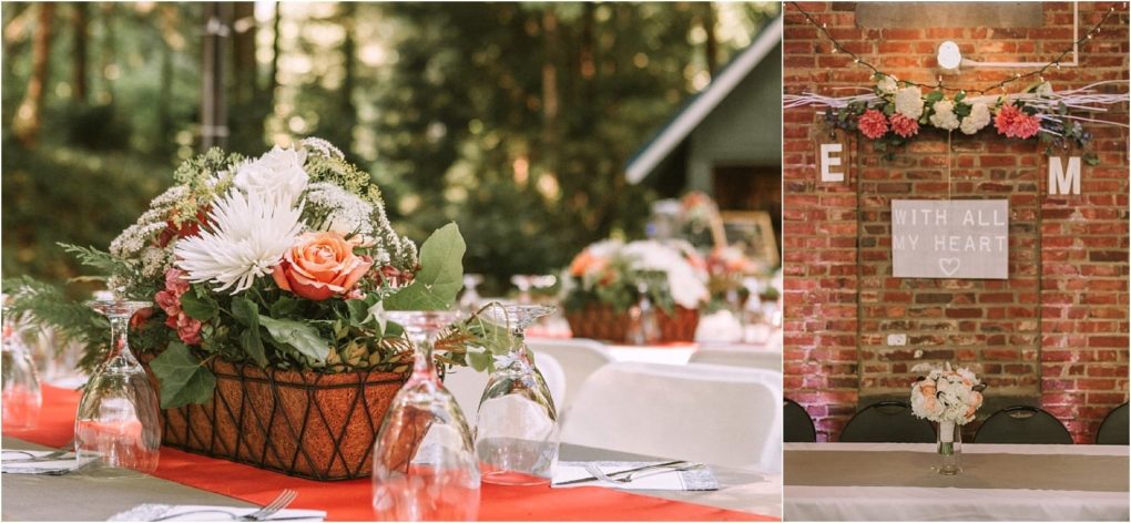 Premier snohomish & seattle wedding photographer | gsquared weddings photography a rustic snohomish wedding reception setup with tables adorned with baskets of flowers upside down glasses and a red table runner in the background a brick wall displays a floral arrangement and a sign reading with all my heart  | serving snohomish seattle                   & beyond