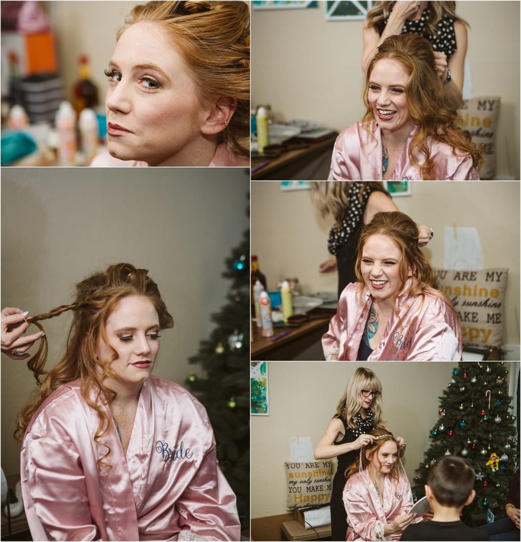 Premier snohomish & seattle wedding photographer | gsquared weddings photography a red haired bride in a pink satin robe laughs with friends while getting her hair styled in a cozy home decorated with a christmas tree celebrating her snohomish seattle wedding engagement | serving snohomish seattle                   & beyond
