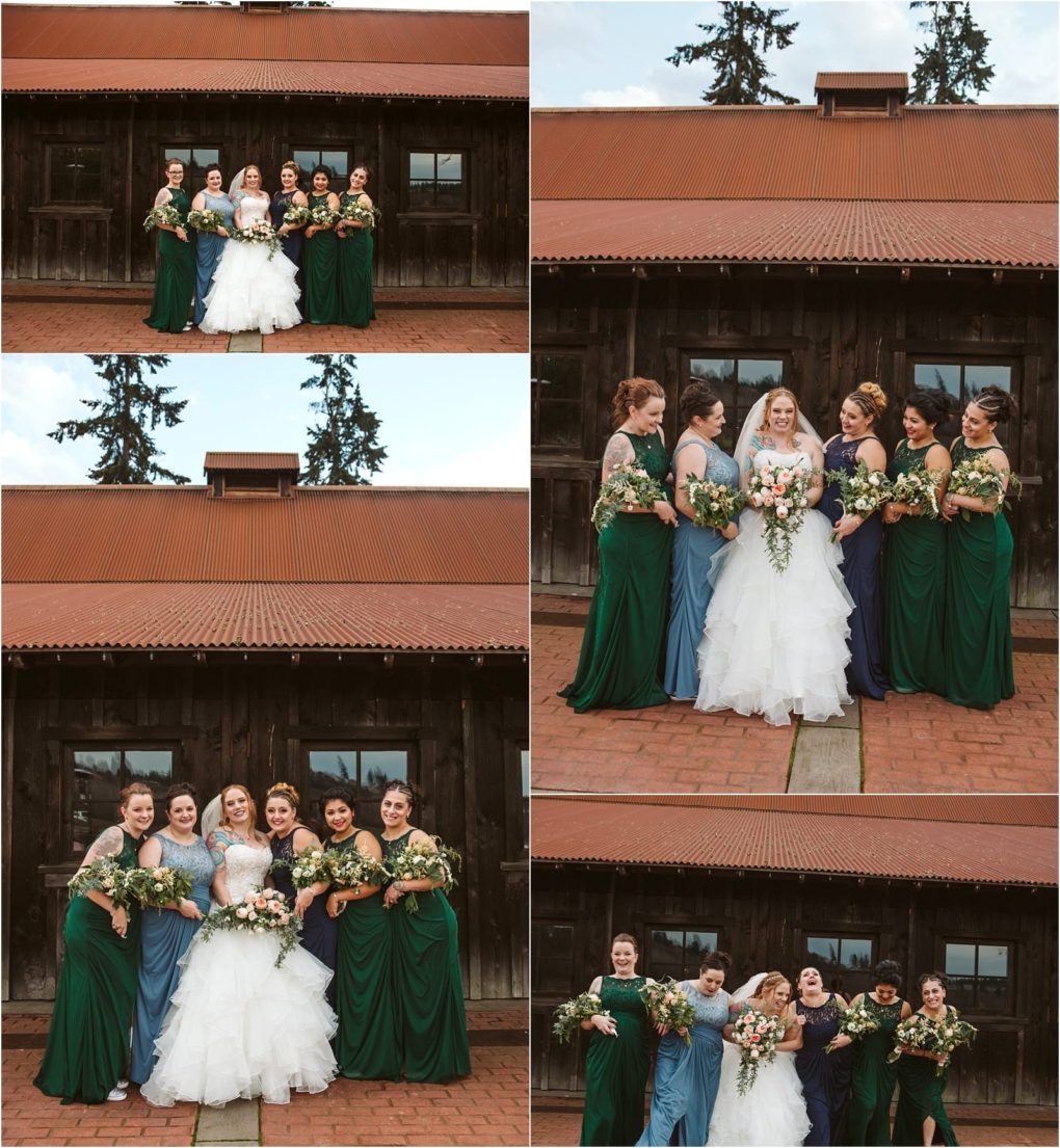 Premier snohomish & seattle wedding photographer | gsquared weddings photography four women in green dresses and two in light blue bridesmaid dresses pose with a bride in white holding bouquets in front of a rustic wooden barn with a red tin roof at a snohomish seattle wedding | serving snohomish seattle                   & beyond