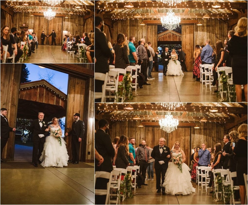 Premier snohomish & seattle wedding photographer | gsquared weddings photography a bride in a white gown walks down the aisle on her fathers arm at a rustic snohomish barn venue adorned with lights and a chandelier Guests stand on either side watching this unforgettable seattle wedding procession | serving snohomish seattle                   & beyond