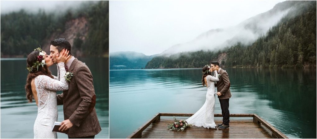 Premier snohomish & seattle wedding photographer | gsquared weddings photography a bride and groom kiss on a wooden dock by a misty blue lake near forested mountainsa romantic snohomish seattle wedding moment The bride wears a lace dress and flower crown the groom dons a brown suit A bouquet rests beside them | serving snohomish seattle                   & beyond