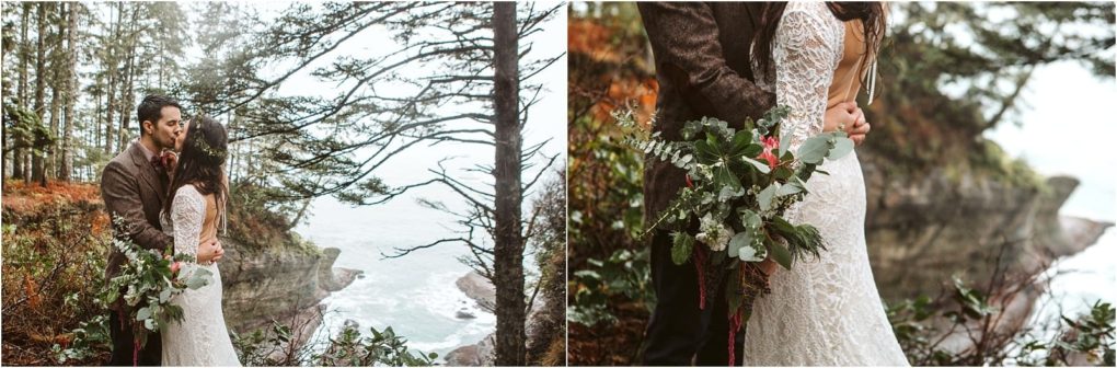 Premier snohomish & seattle wedding photographer | gsquared weddings photography a bride and groom embrace on a forested cliffside overlooking a misty ocean near snohomish the bride wears a lace dress and holds a green bouquet with red accents capturing a dreamy seattle wedding moment | serving snohomish seattle                   & beyond