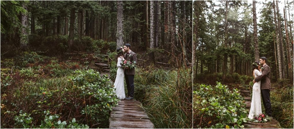 Premier snohomish & seattle wedding photographer | gsquared weddings photography a couple in wedding attire embraces on a wooden path surrounded by lush green forest The bride holds a bouquet and both appear happy and in love amidst the natural woodland setting of a snohomish seattle wedding engagement | serving snohomish seattle                   & beyond