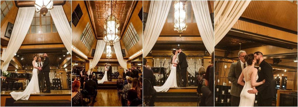 Premier snohomish & seattle wedding photographer | gsquared weddings photography a bride and groom stand at an indoor altar exchanging vows and sharing a kiss before their seated guests The elegant snohomish venue features high ceilings chandeliers and flowing white drapes perfect for a seattle wedding | serving snohomish seattle                   & beyond
