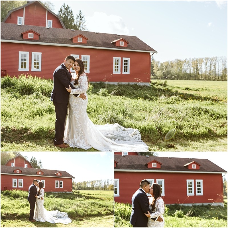Premier snohomish & seattle wedding photographer | gsquared weddings photography a bride and groom in wedding attire embrace and smile outside a large red barn on a bright sunny snohomish day The charming seattle area wedding scene features green grass clear skies and lush trees in the background | serving snohomish seattle                   & beyond