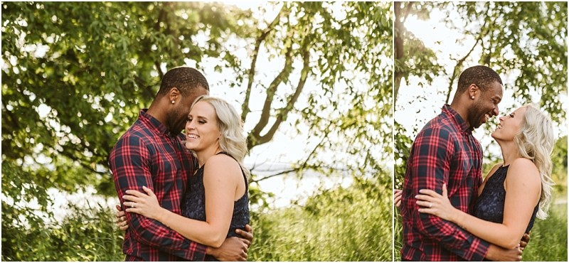 Premier snohomish & seattle wedding photographer | gsquared weddings photography a couple stands outdoors embracing and smiling at each other surrounded by greenery and sunlight filtering through the trees during their snohomish seattle wedding engagement | serving snohomish seattle                   & beyond