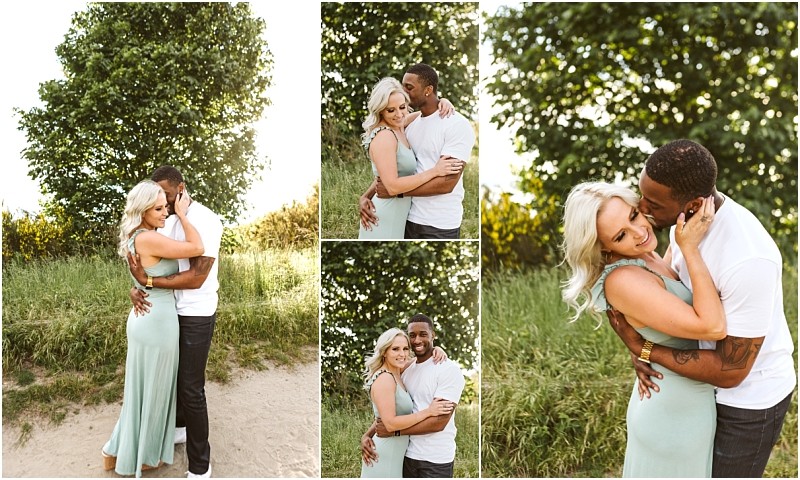 Premier snohomish & seattle wedding photographer | gsquared weddings photography a couple embraces outdoors on a sunny day in snohomish The woman wears a light blue dress and the man wears a white shirt and dark pants They smile and hold each other affectionatelyperfect for a seattle wedding engagement moment among green trees and grass | serving snohomish seattle                   & beyond