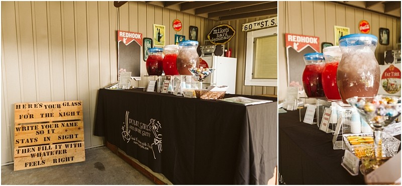 Premier snohomish & seattle wedding photographer | gsquared weddings photography a drink station at a snohomish seattle wedding features large beverage dispensers glassware candy bowls and a sign instructing guests to write their names on their glasses The black cloth-covered table displays a white logo | serving snohomish seattle & beyond Premier snohomish & seattle wedding photographer | gsquared weddings photography a drink station at a snohomish seattle wedding features large beverage dispensers glassware candy bowls and a sign instructing guests to write their names on their glasses The black cloth covered table displays a white logo | serving snohomish seattle & beyond