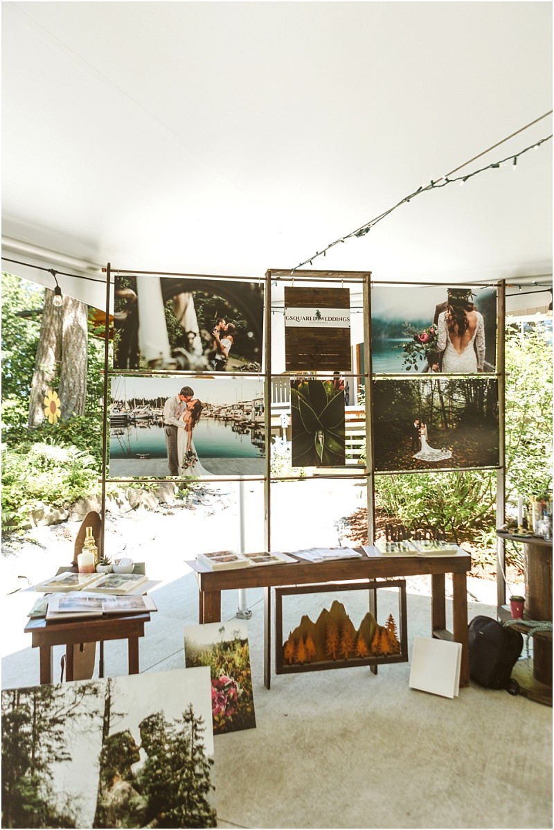 Premier snohomish & seattle wedding photographer | gsquared weddings photography a display booth showcases large snohomish and seattle wedding photography prints alongside stunning nature scenes with more prints and promotional materials arranged on tables below in a bright outdoor setting | serving snohomish seattle & beyond Premier snohomish & seattle wedding photographer | gsquared weddings photography a display booth showcases large snohomish and seattle wedding photography prints alongside stunning nature scenes with more prints and promotional materials arranged on tables below in a bright outdoor setting | serving snohomish seattle & beyond