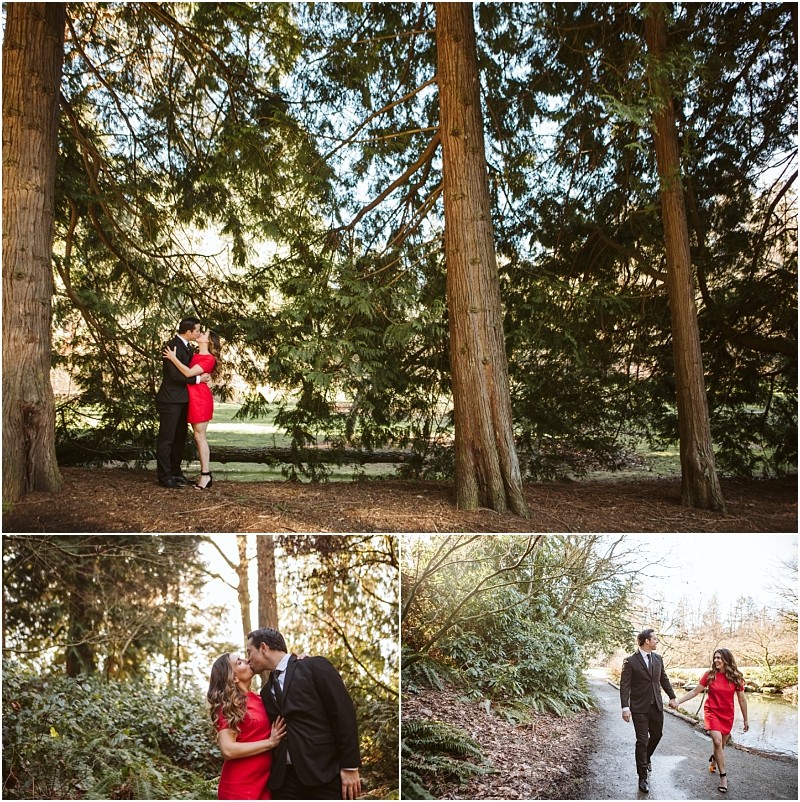 Premier snohomish & seattle wedding photographer | gsquared weddings photography a couple in formal attire the woman in a red dress and the man in a dark suit pose affectionately and walk hand in hand through a sunlit wooded park with tall trees and lush greenery for their snohomish seattle wedding engagement | serving snohomish seattle                   & beyond