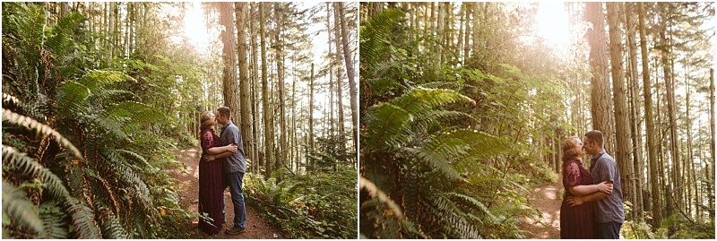 Premier snohomish & seattle wedding photographer | gsquared weddings photography a couple stands embracing and kissing on a forest trail near snohomish surrounded by tall trees and ferns with sunlight streaming through the branchesperfect for a romantic seattle wedding engagement | serving snohomish seattle                   & beyond