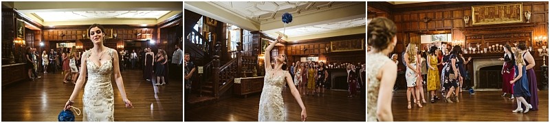 Premier snohomish & seattle wedding photographer | gsquared weddings photography a bride in a white dress prepares to throw her bouquet tossing it over her shoulder as guests eagerly gather to catch it in a wooden paneled hall at a dreamy snohomish seattle wedding | serving snohomish seattle                   & beyond