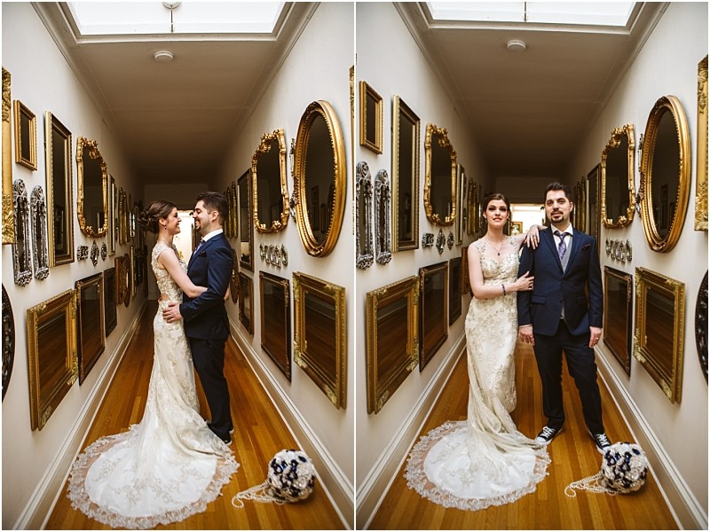Premier snohomish & seattle wedding photographer | gsquared weddings photography a bride in a lace wedding dress and a groom in a suit stand together in a hallway lined with gold framed mirrors and art Capturing their snohomish seattle wedding they embrace in one photo and stand side by side holding hands in another | serving snohomish seattle                   & beyond