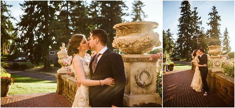 Premier snohomish & seattle wedding photographer | gsquared weddings photography a bride and groom share a kiss on a sunlit brick pathway lined with ornate stone planters and blooming flowers with tall evergreen trees in the background at their romantic snohomish seattle wedding | serving snohomish seattle                   & beyond
