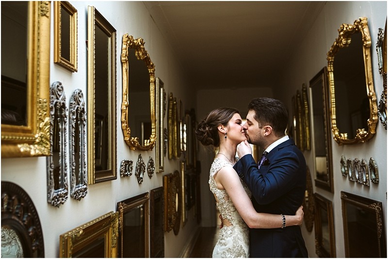 Thornewood castle wedding bride and groom in the hall of mirrors on the 3rd floor of the castle