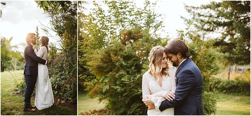 Premier snohomish & seattle wedding photographer | gsquared weddings photography a bride and groom embrace outdoors in a lush snohomish garden dressed in wedding attire The scene is bright and green with trees and bushes in the background as the couple looks lovingly at each other during their wedding engagement | serving snohomish seattle                   & beyond