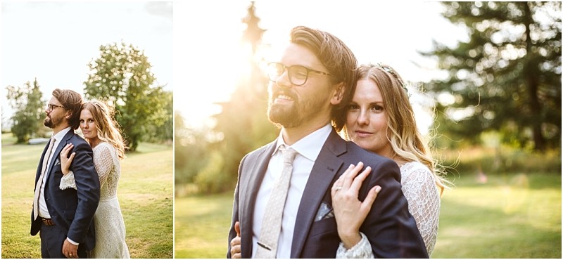 Premier snohomish & seattle wedding photographer | gsquared weddings photography a bride and groom stand closely together outdoors in soft sunlight with the bride embracing the groom from behind Both look content surrounded by greenery and trees at their dreamy snohomish seattle wedding engagement | serving snohomish seattle & beyond Premier snohomish & seattle wedding photographer | gsquared weddings photography a bride and groom stand closely together outdoors in soft sunlight with the bride embracing the groom from behind Both look content surrounded by greenery and trees at their dreamy snohomish seattle wedding engagement | serving snohomish seattle & beyond