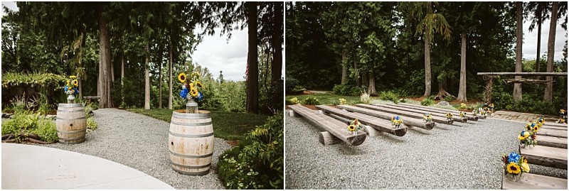 Premier snohomish & seattle wedding photographer | gsquared weddings photography outdoor wedding ceremony area near snohomish and seattle with wooden benches on gravel decorated with sunflowers in jars Wooden barrels and lush green trees surround the rustic settingperfect for a romantic wedding or engagement | serving snohomish seattle                   & beyond