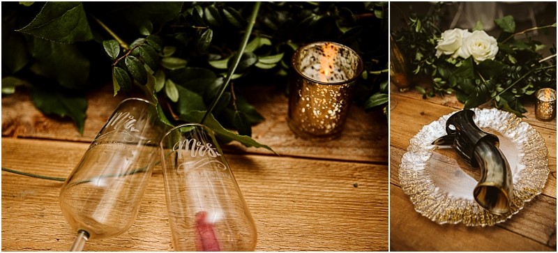 Premier snohomish & seattle wedding photographer | gsquared weddings photography two champagne glasses labeled mr  and mrs  rest on a wooden table with greeneryperfect for a snohomish seattle wedding A gold candle holder glows nearby while a metallic plate holds a decorative horn white roses and another candle in the background | serving snohomish seattle                   & beyond