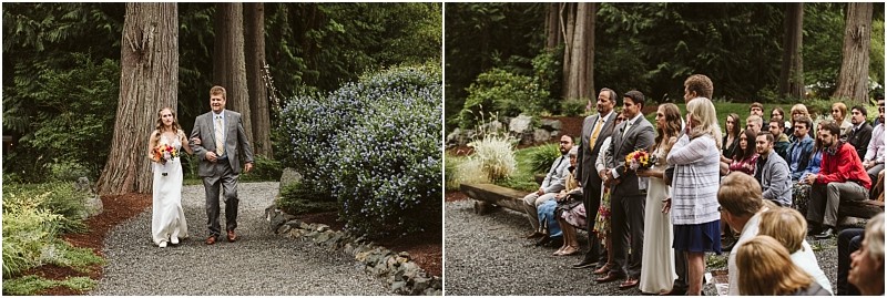 Premier snohomish & seattle wedding photographer | gsquared weddings photography a bride in a white dress walks on a gravel path with a man in a suit through a wooded outdoor area at their snohomish seattle wedding while guests seated on benches watch and smile as they approach | serving snohomish seattle                   & beyond