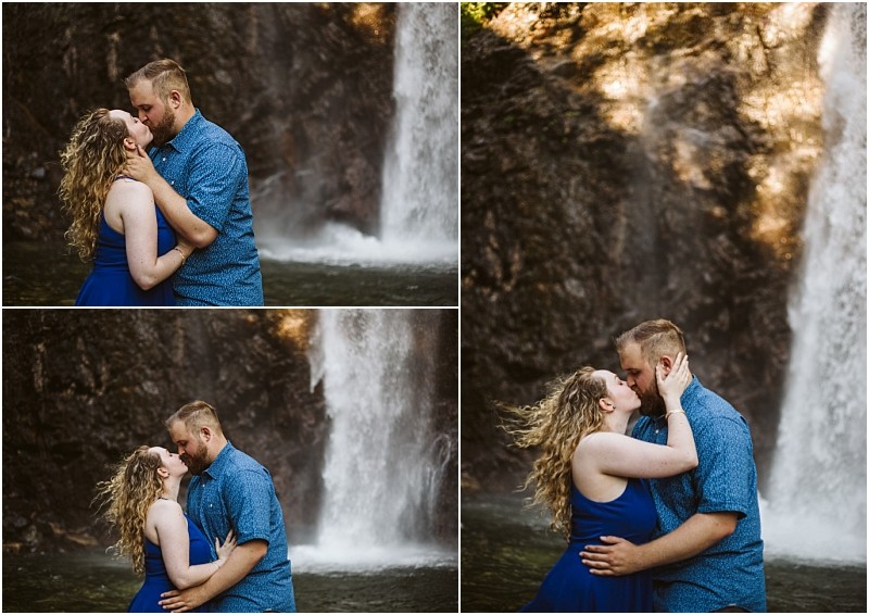 Premier snohomish & seattle wedding photographer | gsquared weddings photography a couple embraces and kisses in front of a waterfall celebrating their seattle engagement Smiling and holding each other close the woman in a blue dress and the man in a blue patterned shirt stand with water cascading behind them | serving snohomish seattle                   & beyond