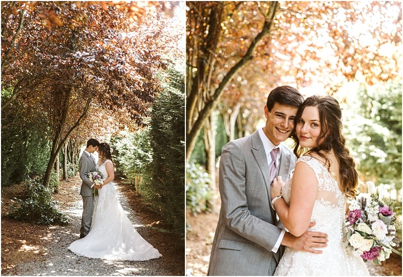 A bride and groom stand close together outdoors under sunlit snohomish trees In one photo they embrace on a leafy path in the other they smile at the camera the bride holding a bouquet of flowers Snohomish wedding photography
