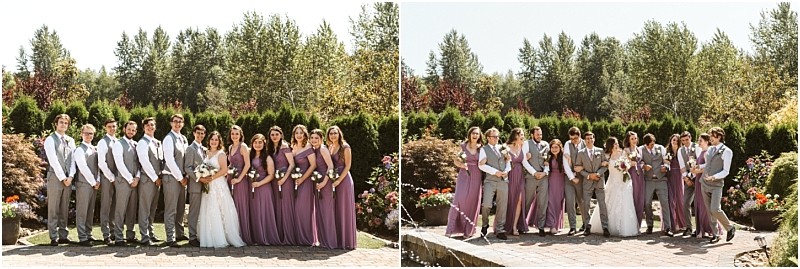 A wedding party poses outdoors in snohomish for two group shots The bridesmaids wear lavender dresses and the groomsmen don grey suits with vests Lush greenery and colorful flowers surround them under a sunny sky Snohomish wedding photography