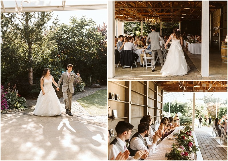 A bride and groom walk outdoors in sunlight then enter a rustic snohomish reception hall with guests seated at tables and are warmly welcomed by a clapping bridal party at a long table Snohomish wedding photography