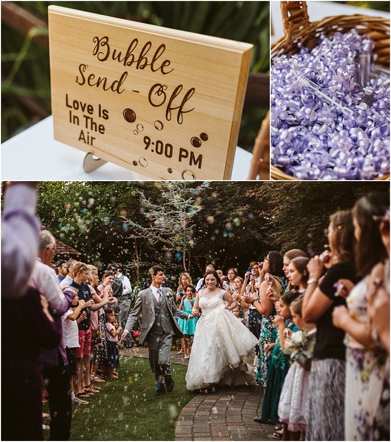 A wooden sign announces a bubble send off at 900 pm in snohomish with a basket of bubble wands ready as the newlywed couple walks through a joyful crowd blowing bubbles during an outdoor wedding celebration Snohomish wedding photography