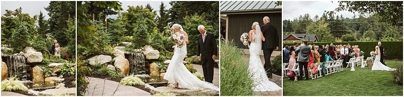 A bride in a white dress walks with an older man down a garden path in snohomish past rocks and a waterfall then toward seated guests at an outdoor wedding ceremony Snohomish wedding photography