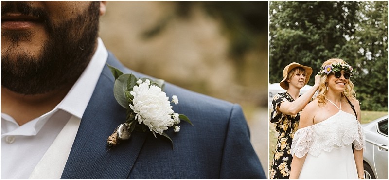 Close up of a man in a blue suit with a white boutonniere on the left on the right a woman in a floral dress helps a smiling snohomish bride in sunglasses and a flower crown adjust her hair outdoors Snohomish wedding photography
