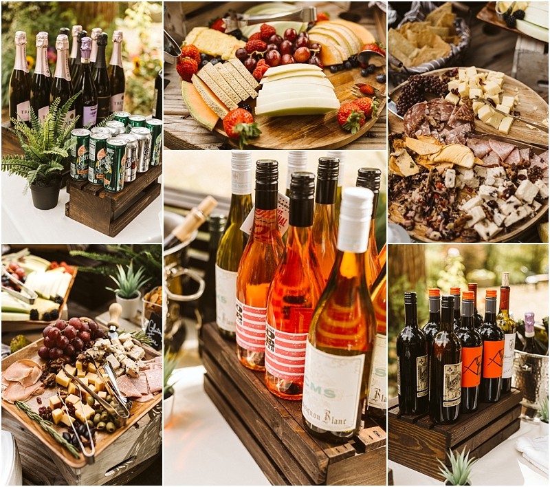 A collage of assorted party foods and drinks including bottles of wine sparkling beverages charcuterie boards with cheese fruit meats crackers and snacks arranged on wooden trays and surrounded by greenery in a snohomish setting Snohomish wedding photography