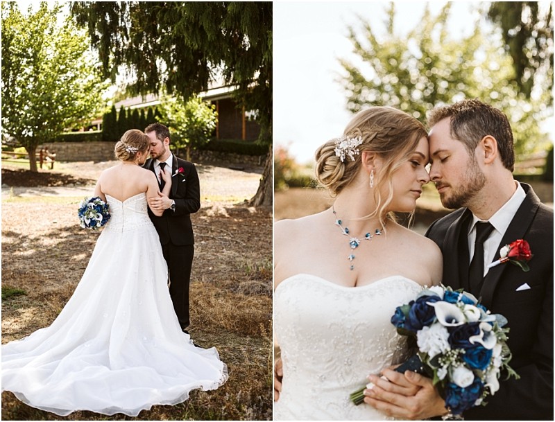 Premier snohomish & seattle wedding photographer | gsquared weddings photography a bride in a white gown and a groom in a black suit share an intimate moment outdoors during their snohomish seattle wedding holding a bouquet of blue and white flowers as they stand close under sunlit trees | serving snohomish seattle                   & beyond