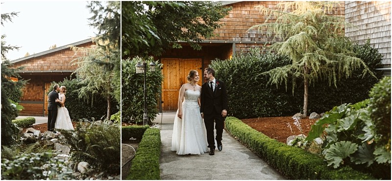 Premier snohomish & seattle wedding photographer | gsquared weddings photography a bride and groom walk together and embrace in a lush garden courtyard outside a wooden building surrounded by greenery and hedgesa romantic snohomish seattle wedding moment | serving snohomish seattle                   & beyond