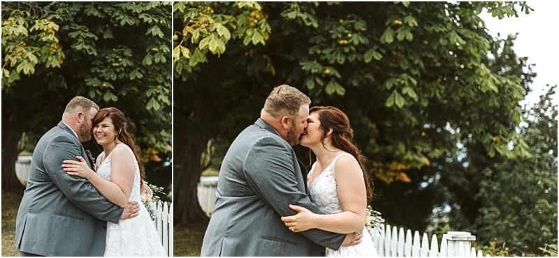 Premier snohomish & seattle wedding photographer | gsquared weddings photography a bride and groom stand outdoors by a white picket fence smiling and embracing in front of green trees In one image they share a kiss in the other they laugh together on their snohomish wedding day near seattle | serving snohomish seattle                   & beyond