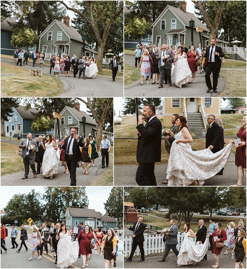Premier snohomish & seattle wedding photographer | gsquared weddings photography a joyful snohomish wedding procession moves down a neighborhood street with the bride in a white gown groom guests musicians and pets walking together past houses and trees on a sunny day | serving snohomish seattle                   & beyond