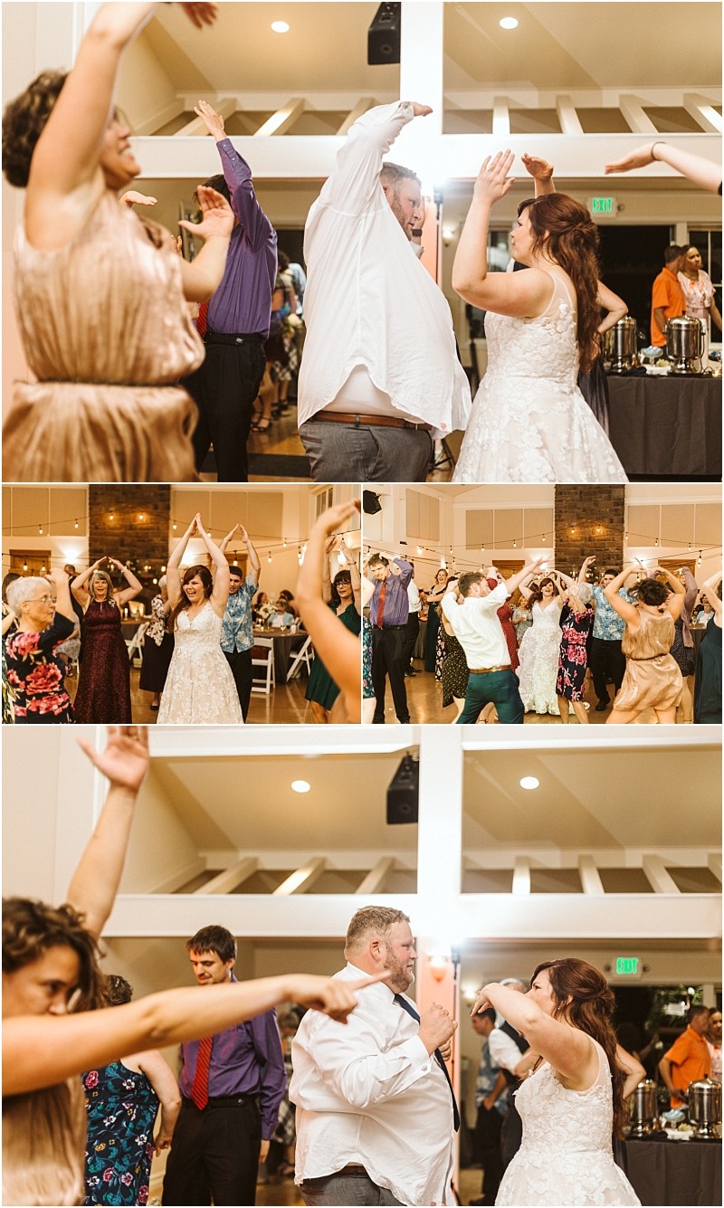Premier snohomish & seattle wedding photographer | gsquared weddings photography a bride and groom dance joyfully with guests all raising their arms and smiling at a lively indoor snohomish wedding reception The atmosphere is festive and celebratory | serving snohomish seattle                   & beyond