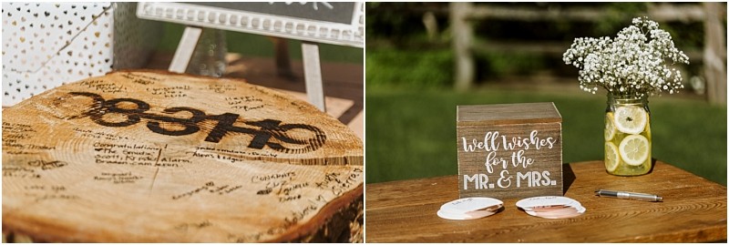 Premier snohomish & seattle wedding photographer | gsquared weddings photography a wooden guestbook slab with signatures sits next to a box labeled well wishes for the mr & mrs And a jar of flowers with lemon slices on an outdoor tableperfect for a charming snohomish or seattle wedding engagement | serving snohomish seattle                   & beyond