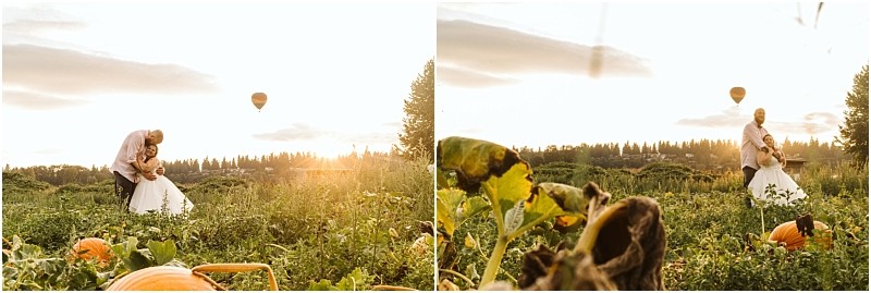 Premier snohomish & seattle wedding photographer | gsquared weddings photography a couple in wedding attire poses in a sunlit snohomish pumpkin patch surrounded by green plants and pumpkins with a hot air balloon floating in the skycapturing the magic of a seattle wedding engagement | serving snohomish seattle                   & beyond