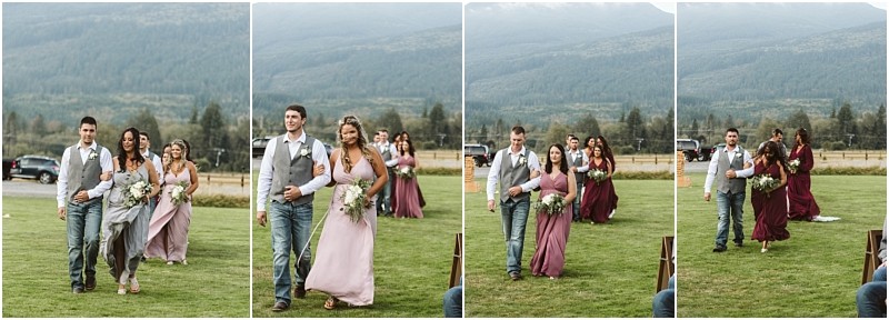 Premier snohomish & seattle wedding photographer | gsquared weddings photography a sequence of outdoor snohomish wedding photos shows bridesmaids in mauve dresses and groomsmen in vests and jeans walking arm in arm across a grassy field with mountains in the background | serving snohomish seattle                   & beyond