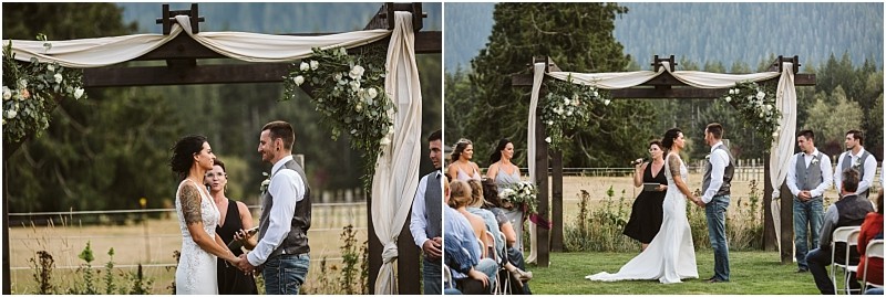Premier snohomish & seattle wedding photographer | gsquared weddings photography a bride and groom stand under a rustic wooden arch with white drapes and flowers exchanging vows outdoors in the mountains near snohomish Bridesmaids groomsmen and guests look on during this beautiful seattle wedding | serving snohomish seattle                   & beyond