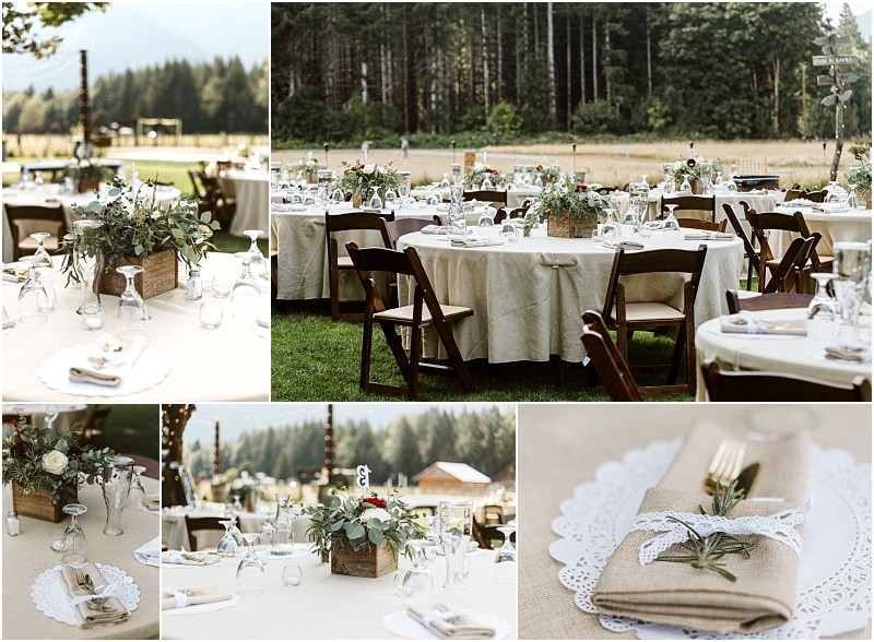 Premier snohomish & seattle wedding photographer | gsquared weddings photography rustic outdoor wedding reception near snohomish seattle with round tables set with beige linens wooden chairs mason jar centerpieces of greenery and napkins tied with twine and rosemary sprigs against a forested backdropperfect for wedding or engagement celebrations | serving snohomish seattle                   & beyond