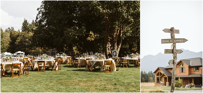 Premier snohomish & seattle wedding photographer | gsquared weddings photography outdoor wedding reception setup with round tables and wooden chairs on grass under large trees to the right a rustic wooden signpost points to fun & gamesa picturesque snohomish seattle wedding scene with a house and mountains in the background | serving snohomish seattle                   & beyond