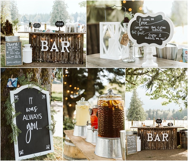 Premier snohomish & seattle wedding photographer | gsquared weddings photography a rustic outdoor bar setup with a wooden bar chalkboard signs drinks in glass dispensers and decorative lanterns under treesperfect for a snohomish or seattle wedding or engagement set against mountains and lush greenery | serving snohomish seattle                   & beyond